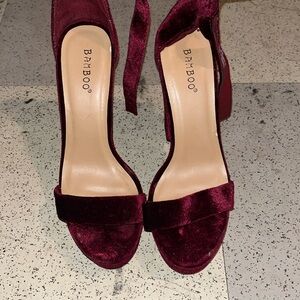 very high red velvet heels